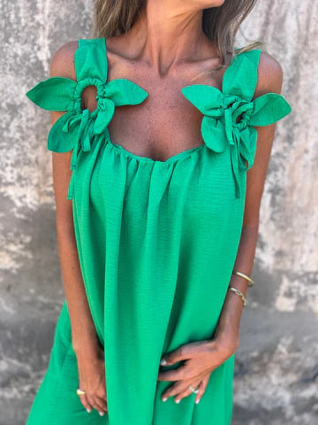 Solid color dress with floral pattern