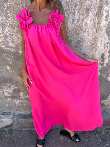 Solid color dress with floral pattern