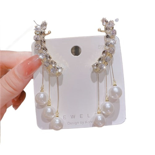 Crescent Moon Pearl Tassel Elegance